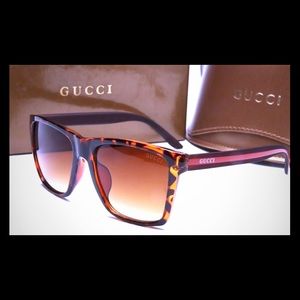New! Gucci Authentic sunglasses! With a case.